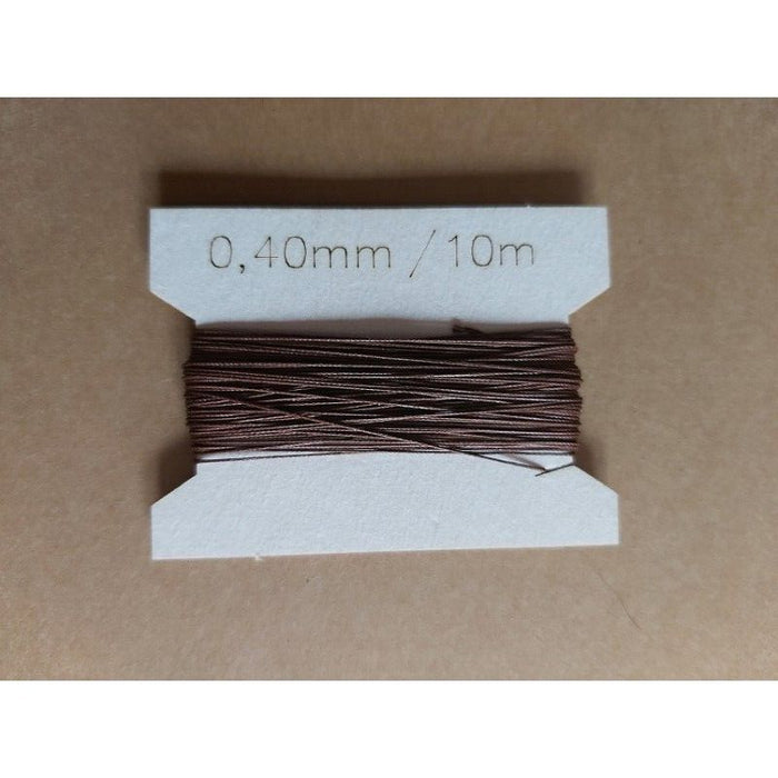 Image of Seahorse Brown Rope 0.40mm 10m, ideal for model ship rigging, showcasing its fine diameter and authentic brown color for realistic scale modeling.