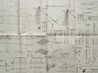 Photo of the worn cover and detailed A1 sheets of the 1715 Ingermanland Russian Flagship Model Plans by LOK, showcasing the historical and model-building value despite age signs.