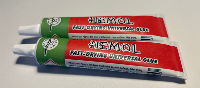 Image showcasing Wamod's HEMOL Universal Adhesive, highlighting its versatile use for bonding a variety of materials with a strong, durable finish.