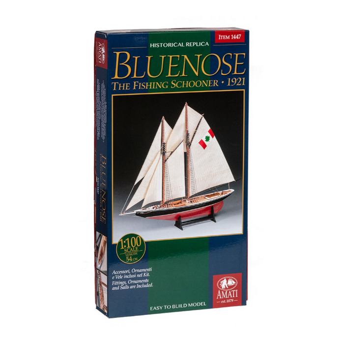 Image showcasing Amati's Bluenose wooden model kit, featuring intricate parts and assembly tools for creating a detailed scale replica of the famous racing schooner, known for its precision craftsmanship and authentic design.