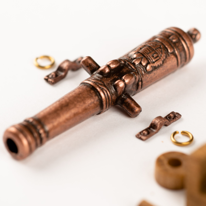 Image of Amati B4159,40 40mm Cannon with Wooden Carriage, showcasing a detailed and historically accurate miniature perfect for enhancing model ships and dioramas.
