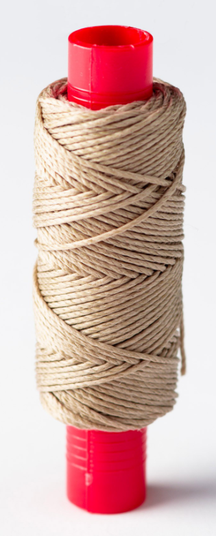 Photo of Amati model ship rigging rope, 1mm x 20m, showcasing the texture and natural color.