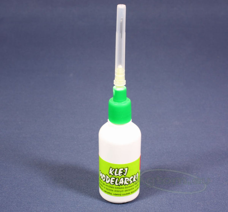 Image of Wamod 30g Adhesive with Needle, designed for precise application on plastic models, showcasing the product's packaging and needle tip for accurate glueing.