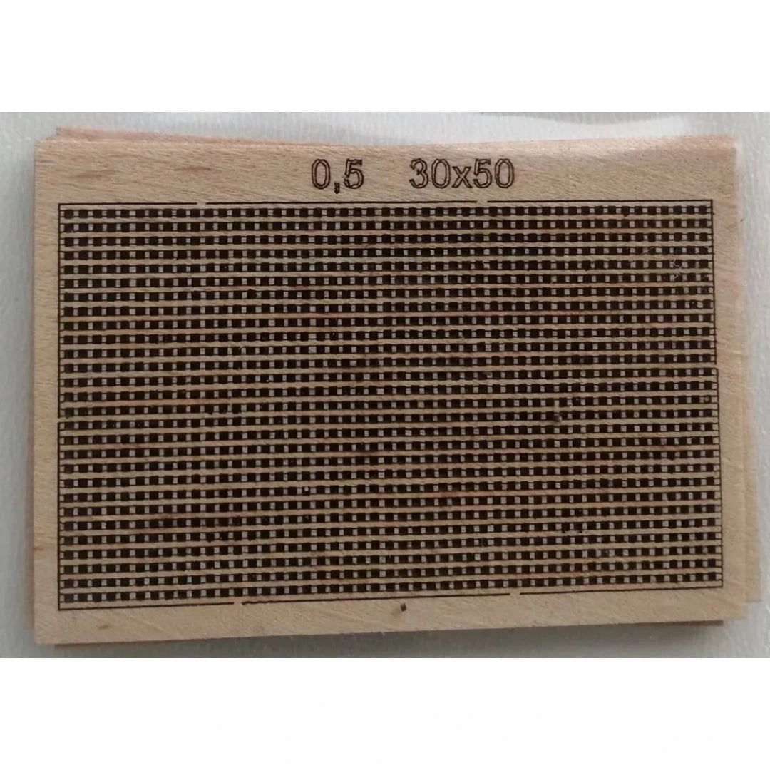 Photo of high-quality wooden grating with a 0.5x0.5mm grid and 30x50mm dimensions for model making.