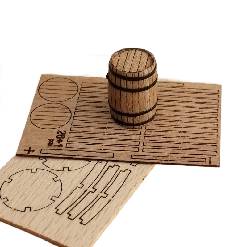 Photo of wooden barrels for model ships in 3 sizes by ModelNet – self-assembly kit