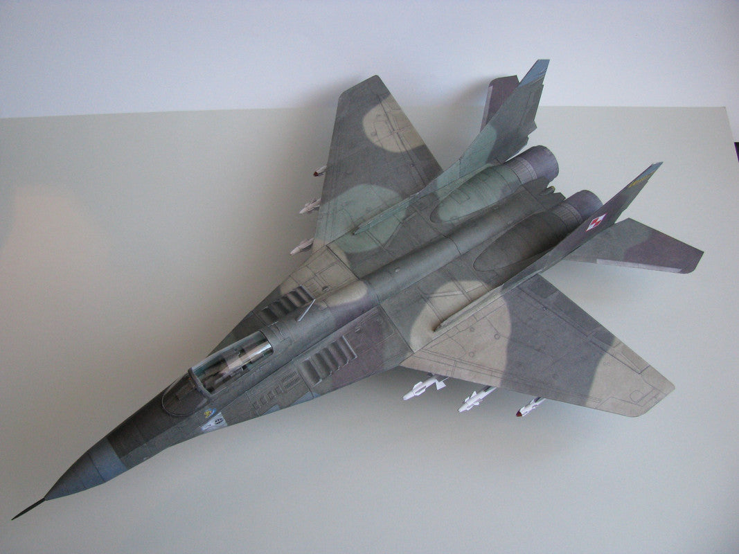 Image showcasing the MiG-29A (Fulcrum-A) 1:33 scale card model kit by WAK Publishing, highlighting the kit's detailed design and components for an accurate replica.