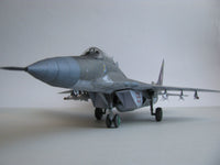 Image showcasing the MiG-29A (Fulcrum-A) 1:33 scale card model kit by WAK Publishing, highlighting the kit's detailed design and components for an accurate replica.