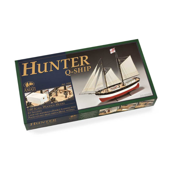 Image of Amati's Hunter Q-Ship wooden model kit, showcasing the detailed components and assembly materials for creating a scale replica of the World War I decoy vessel, with intricate designs and authentic historical features.