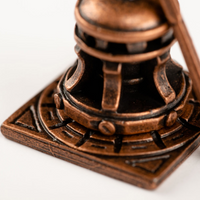 Photo of Amati B4117 18mm Metal Windlass, showcasing a detailed and authentic metal piece designed for adding realistic, historical charm to model ship decks.
