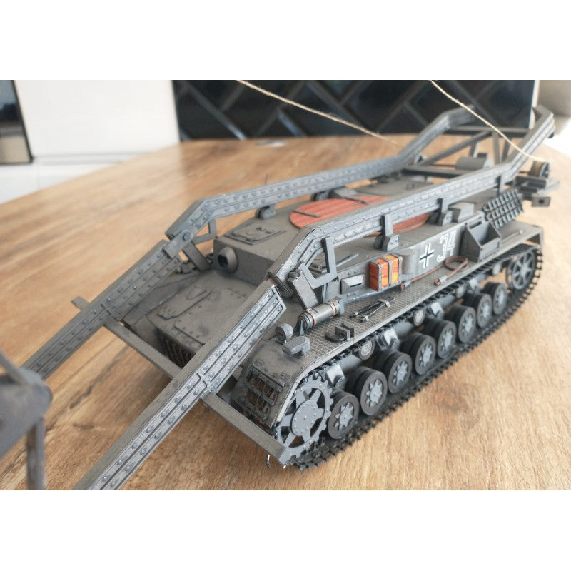 Photo of the cardboard model kit of the Armored Bridgelayer Brückenleger IVb in 1:25 scale by Answer/Angraf, showing A3 sheets and detailed components.