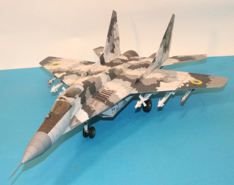 Image of the MiG-29 Fulcrum-C 1:33 Scale Card Model Kit by WAK Publishing, showcasing the kit's high-quality card pieces and detailed design for a realistic replica.
