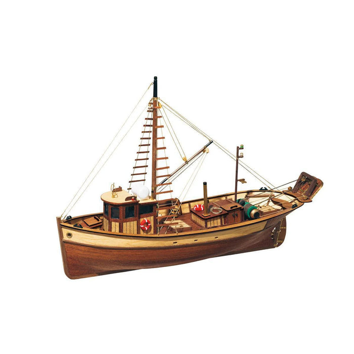 Photo of the Palamós Fishing Boat Model Kit (1:45 scale) by OcCre, showcasing a detailed wooden replica of a traditional Spanish coastal fishing vessel.