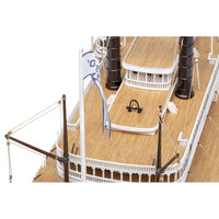 Photo of the Robert E. Lee Assembly Box (2024 Edition) by Amati, featuring a detailed steamboat model with a solid wood hull, metal accents, and brass railings.