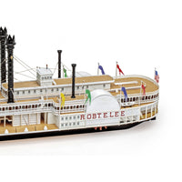 Photo of the Robert E. Lee Assembly Box (2024 Edition) by Amati, featuring a detailed steamboat model with a solid wood hull, metal accents, and brass railings.