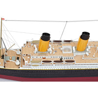 Photo of Amati Titanic 2025 Edition model kit, featuring realistic deck details, transparent domes, and photo-etched enhancements in 1:250 scale.