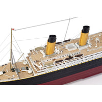 Photo of Amati Titanic 2025 Edition model kit, featuring realistic deck details, transparent domes, and photo-etched enhancements in 1:250 scale.