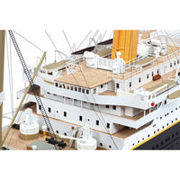 Photo of Amati Titanic 2025 Edition model kit, featuring realistic deck details, transparent domes, and photo-etched enhancements in 1:250 scale.