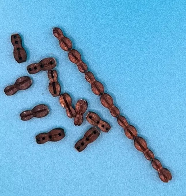 Photo of wooden violin blocks in sizes 7mm, 8mm, and 9mm (20 pieces), arranged in a neat stack.