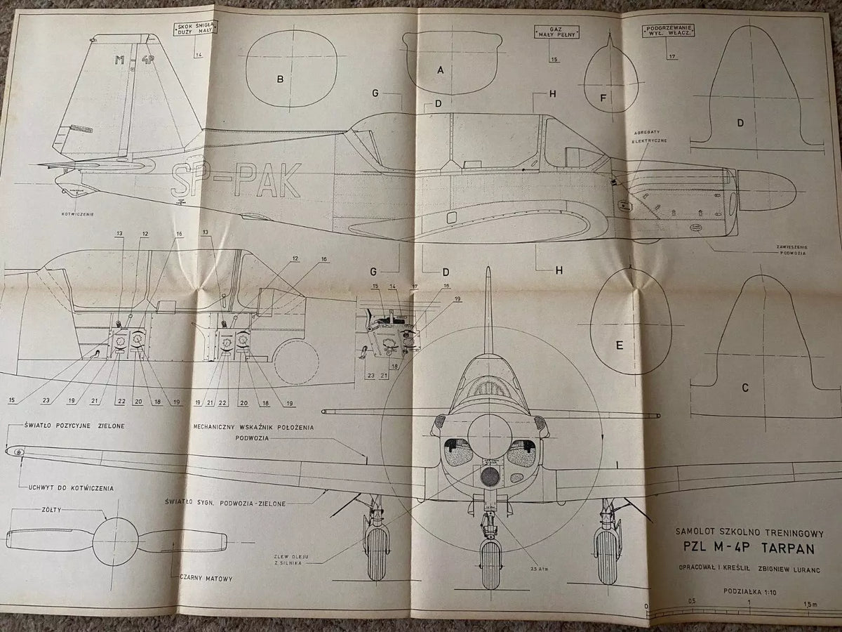 Photo of vintage 1977 PZL M-4 Tarpan construction plans by LOK, showing A1 sheets with detailed aircraft drawings and Polish text.