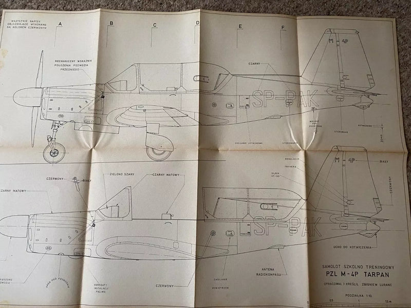 Photo of vintage 1977 PZL M-4 Tarpan construction plans by LOK, showing A1 sheets with detailed aircraft drawings and Polish text.