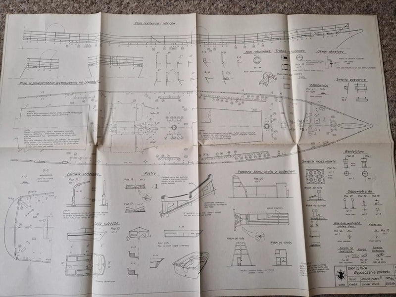 Photo of ORP Iskra model plans from 1986 by Liga Ochrony Kraju (LOK), featuring 6 A1-sized sheets with blueprints and historical descriptions in Polish.