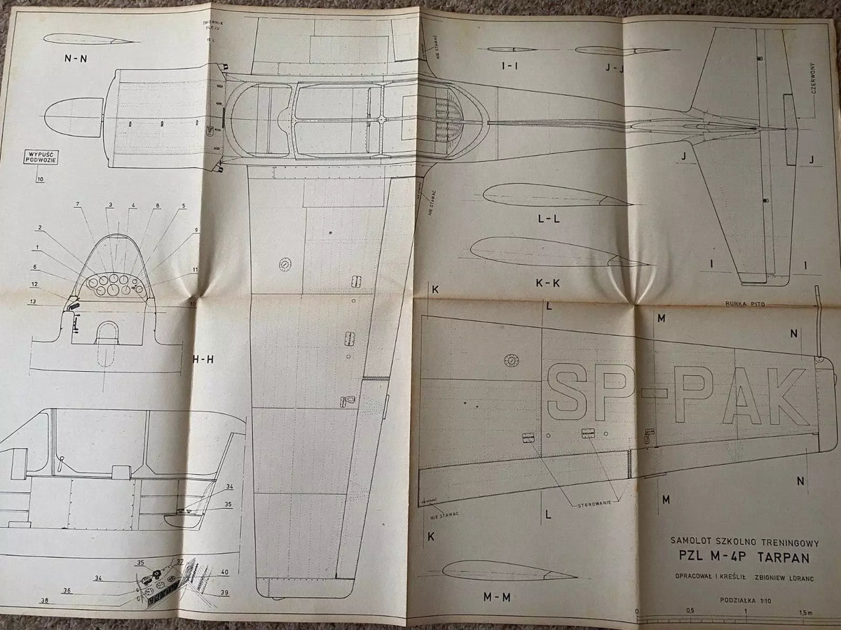 Photo of vintage 1977 PZL M-4 Tarpan construction plans by LOK, showing A1 sheets with detailed aircraft drawings and Polish text.