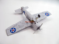Image showcasing the F4F-4 Wildcat 1:33 Scale Card Model Kit by WAK Publishing, featuring precision-cut parts and detailed design for an authentic model building experience.
