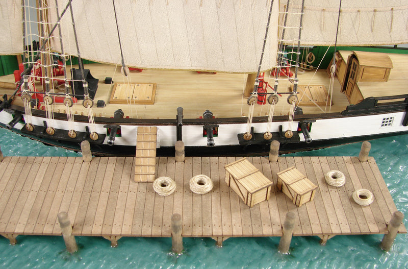 Photo of the Berbice Card Model Kit from Shipyard, showcasing the detailed components and design of the historic ship replica made from high-quality card materials.