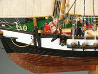 Photo of the Berbice Card Model Kit from Shipyard, showcasing the detailed components and design of the historic ship replica made from high-quality card materials.