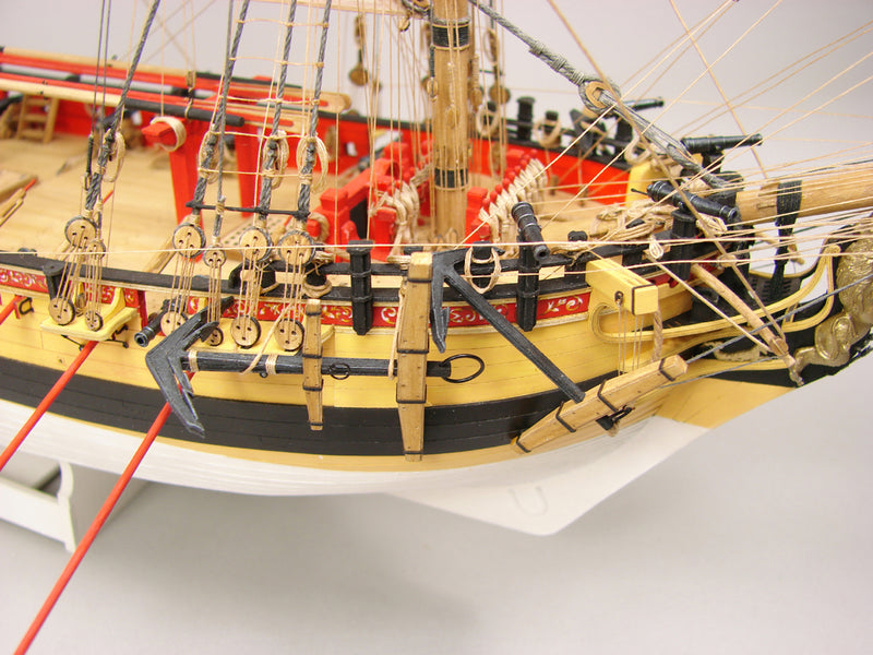 Photo of Shipyard's HMS WOLF Card Model Kit, showcasing the detailed laser-cut frame and high-quality materials, ideal for building an accurate historical ship model.