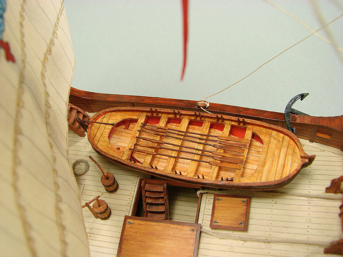 Image of the SANTA MARIA & NINA Card Model Kit by Shipyard, showcasing detailed components and laser-cut frames for building historically accurate ship replicas.