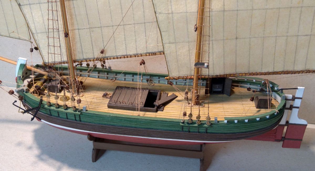 Image of the TRABACCOLO 1:100 scale card model kit by WAK Publishing, showcasing the kit's detailed components and design for a historically accurate replica.