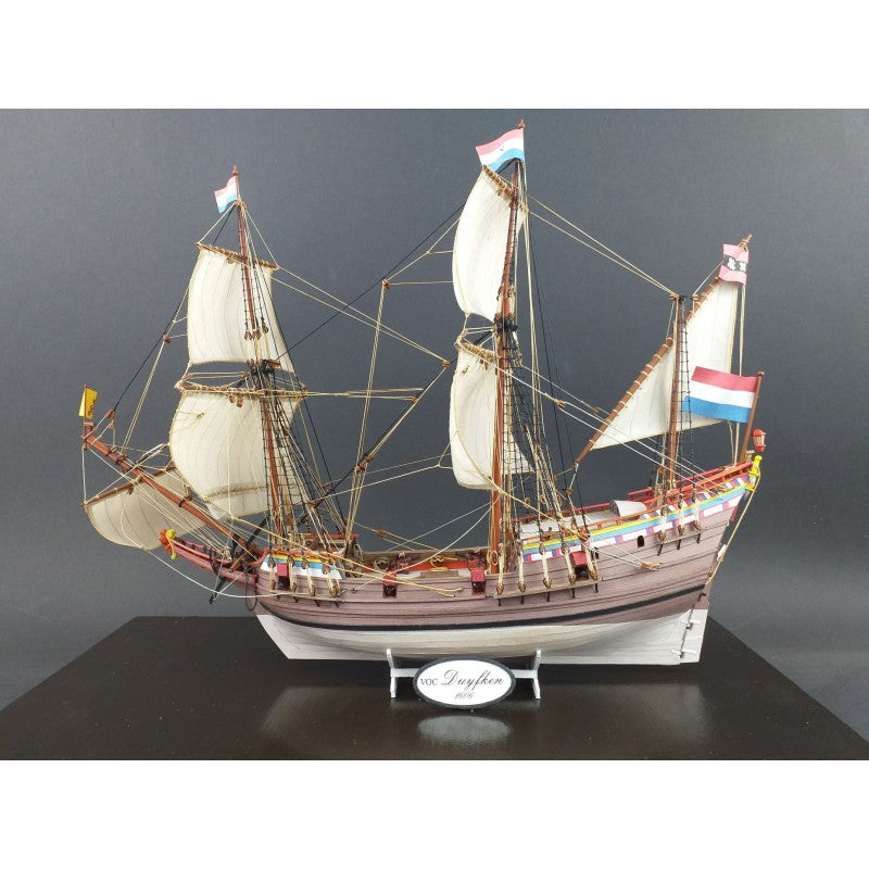 Photo of the VOC 'DUYFKEN' 1606 Card Model 1:100 from Seahorse Publishing, showcasing the detailed replica of the historic Dutch exploration ship in a comprehensive model kit.