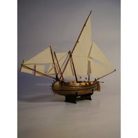 Image of the Muleta de Seixal 1:100 Scale Card Model Kit by WAK Publishing, showcasing the detailed components and design of this traditional Portuguese fishing boat model.